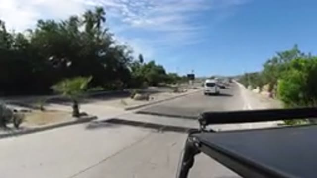LOS CABOS MEXICO-2019: Car View Going Down The Road In Mexico With Blue Skies
