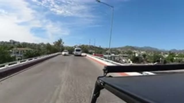 LOS CABOS MEXICO-2019: Fast Pacing Vehicles On The Road Seem To Be Going