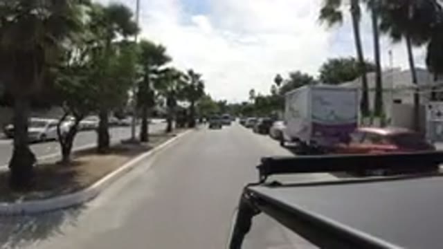 LOS CABOS MEXICO-2019: Footage Of A Camera On Top Of A Jeep Driving Through Town