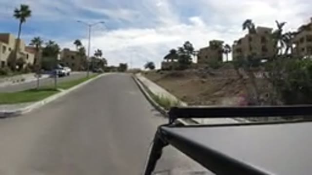 LOS CABOS MEXICO-2019: The View Of A Vehicle Moving On A Two Lane Road With