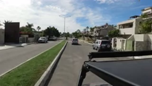 LOS CABOS MEXICO-2019: Video Of A Camera On Top Of A Jeep Moving Slowly Through