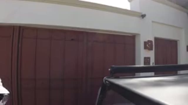 LOS CABOS MEXICO-2019: Vehicle Inside Porch With Big Iron Gates