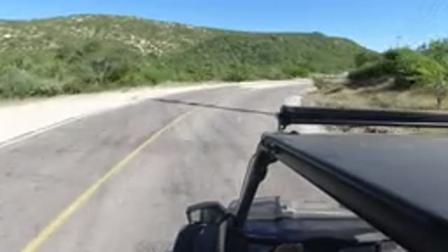 LOS CABOS MEXICO-2019: Driving Down A Rural Road With The Windows Down