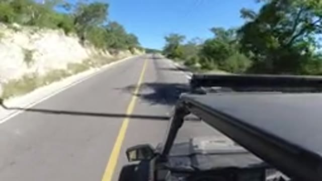 LOS CABOS MEXICO-2019: Car Vehicle Heading Down The Road In Sunny Weather