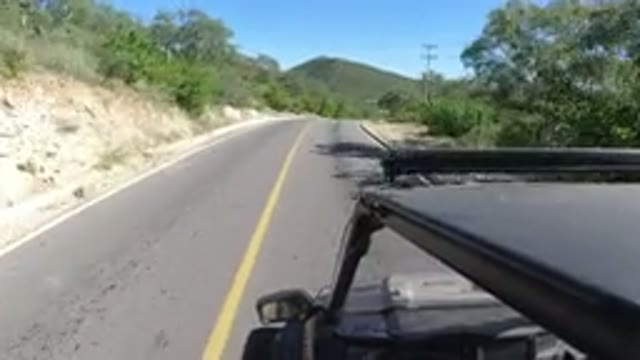 LOS CABOS MEXICO-2019: Video Of A Car Driving Near The Mountains