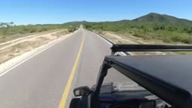 LOS CABOS MEXICO-2019: Dad Drives On A Sunny, Empty, Clean Road