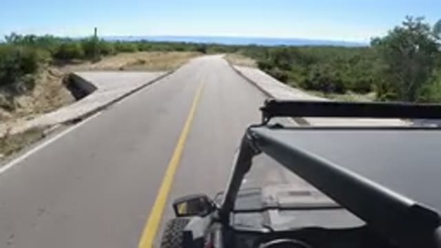 LOS CABOS MEXICO-2019: A Vehicle Moving Fast Through A Highway Running Between