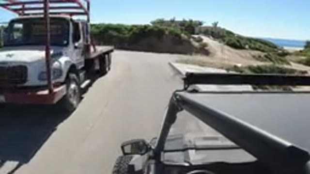 LOS CABOS MEXICO-2019: Onboard View Of A Vehicle Driving Past A Truck