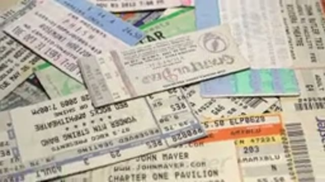 Pile Of Assorted Musical Event Tickets Twirls Clockwise On Screen