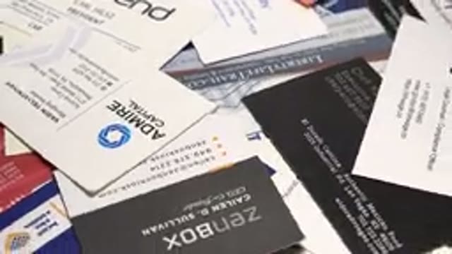 Rotating Shot Of Promotional Mail Laying In A Pile