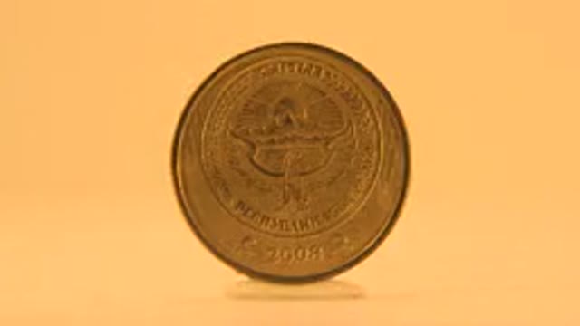 Gold Coin Rotates Endlessly