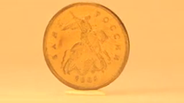 Video Of A Cheek Russian Ruble Brass Coin Rotating In View