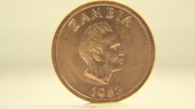A Golden Coin Rotates Endlessly