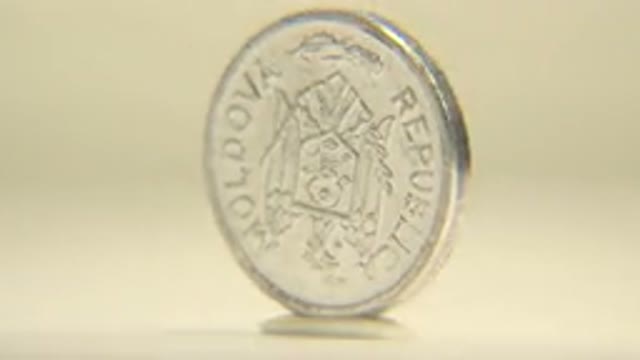 Five Bani Moldovan Coin Rotates On Its Edge