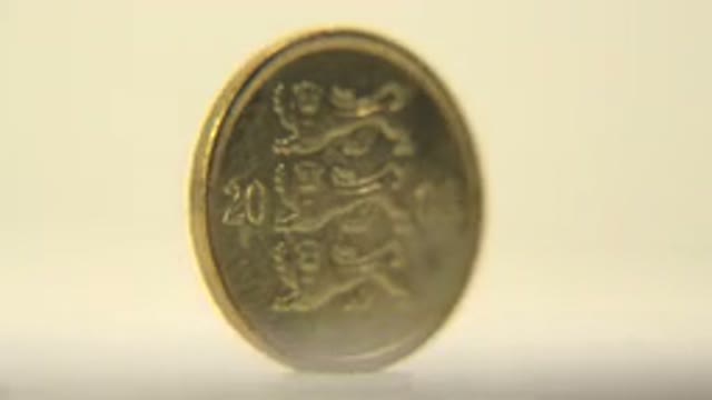 View Of A Golden Coin With Drawings Of Lions The Year And Inscriptions