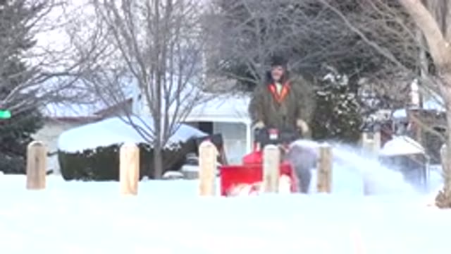 HIDDEN LAKE COLORADO-2014: Man Removes Thick Snow in His Lawn