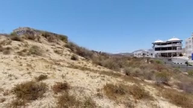 SAN JOSE DEL CABO MEXICO-2020: Sand Pile And Then A Building