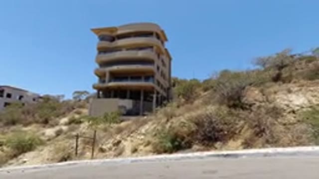 SAN JOSE DEL CABO MEXICO-2020: A View Of A Tall Building In A Dry Place On A