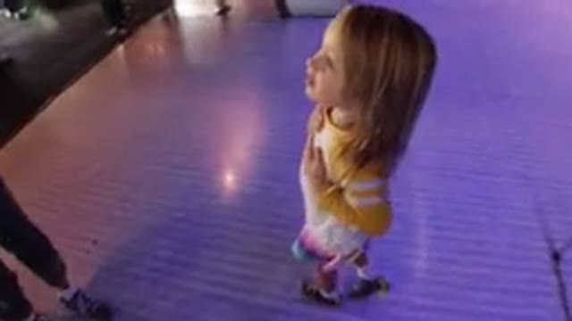 WINTER PARK COLORADO-2019: Excited Little Girl Hits Her Chest Then Walks Over To