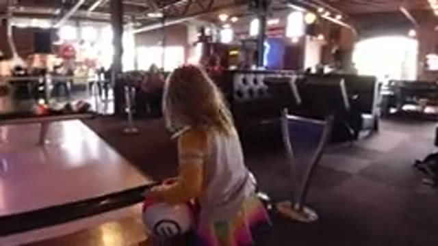 WINTER PARK COLORADO-2019: Young Female Child With Blond Hair Selecting Her Bowling Ball
