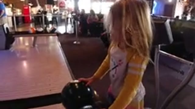 WINTER PARK COLORADO-2019: Cutest Little Girl Plays Bowling With Giant Cue Balls