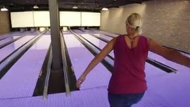 WINTER PARK COLORADO-2019: A Woman Playing Bowling Indoors