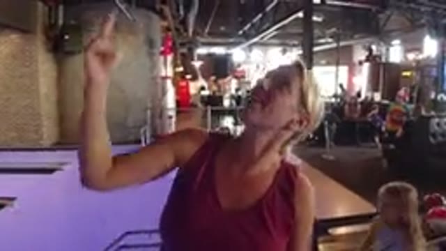 WINTER PARK COLORADO-2019: Woman With Her Child Having Fun And Impressed In A Bowling Alley