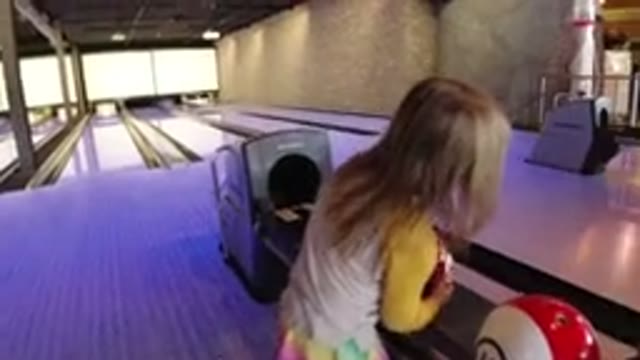 WINTER PARK COLORADO-2019: Small Blond Girl Struggles to Spin Heavy Bowling Balls