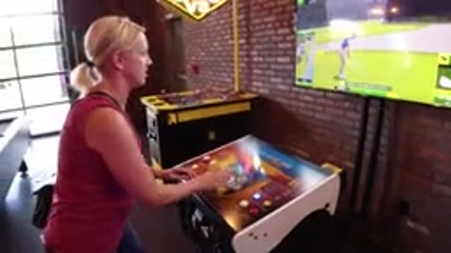 WINTER PARK COLORADO-2019: Video Of A Woman Playing A Virtual Game On A TV