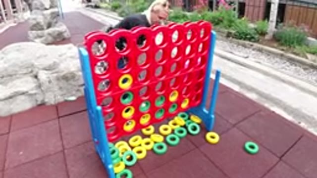 WINTER PARK COLORADO-2019: Mom Showing Her Daughter How To Arrange Color Rings