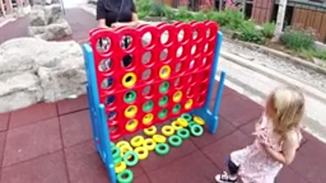WINTER PARK COLORADO-2019: Mom And Daughter Playing In The Free Space With Toys