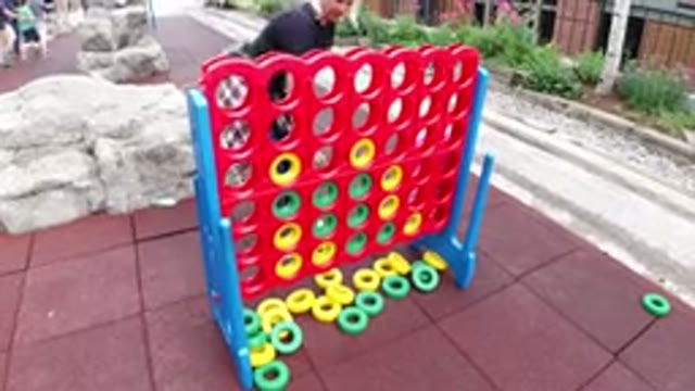 WINTER PARK COLORADO-2019: A Person Playing a Huge Connect Four Game Alone