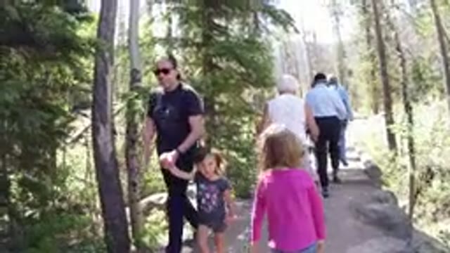 WINTER PARK COLORADO-2019: Some People Going to Hills with an Old Woman Using a Walking Stick