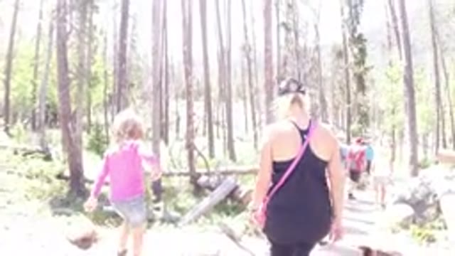 WINTER PARK COLORADO-2019: Mother And Daughter Going Down Stairs In The Woods