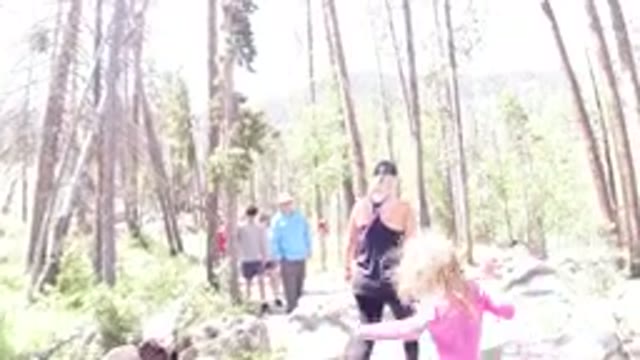 WINTER PARK COLORADO-2019: A Big Group Of People Walking Along A Nature Trail