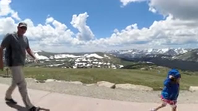 WINTER PARK COLORADO-2019: Vehicles Are Sitting In The Parking Lot Close To The Hill