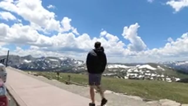 WINTER PARK COLORADO-2019: A Man Walking On A Path Near The Mountains