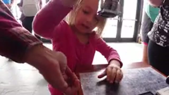 WINTER PARK COLORADO-2019: A Girl Making an Impression on Someone's Hand