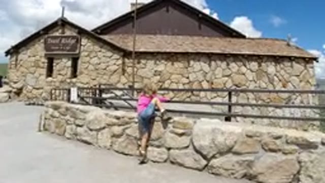 WINTER PARK COLORADO-2019: A Little Girl In Hiking Boots And A Pink Shirt