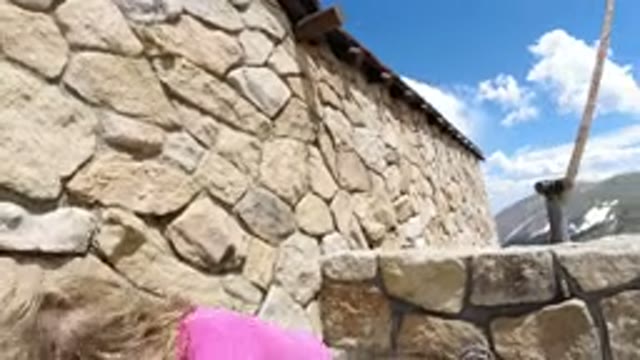 WINTER PARK COLORADO-2019: A Girl Trying To Climb Out Of A Well Using A Rod