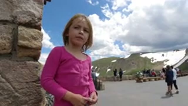 WINTER PARK COLORADO-2019: Girl Interview Outdoors On A Sunny Day With Clouds