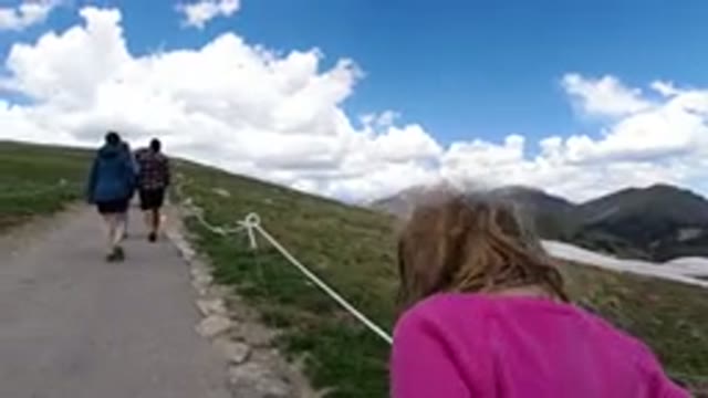WINTER PARK COLORADO-2019: Child Walking Up A Pathway With Others