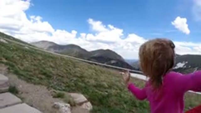 WINTER PARK COLORADO-2019: Little Girl Climbing Stairs in a Land Close to the Mountains