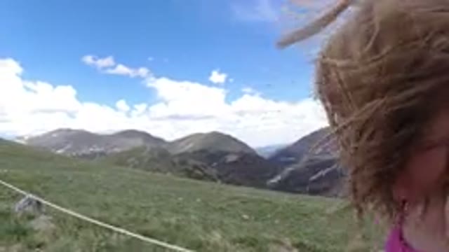 WINTER PARK COLORADO-2019: Girl Walking Enjoying Breeze Surrounded Mountains