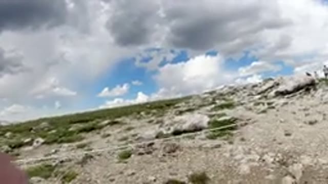 WINTER PARK COLORADO-2019: A Nature View With People Hiking Among Mountains And Clouds