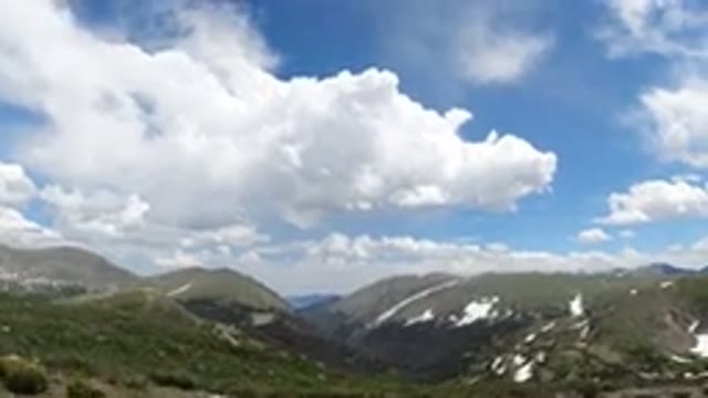 WINTER PARK COLORADO-2019: The Outdoors Large Mountains With Cloudy Blue Skies