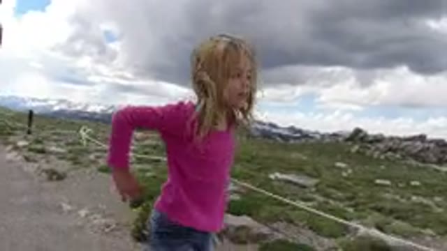 WINTER PARK COLORADO-2019: Little Blonde Girl Enjoying Walk With Family