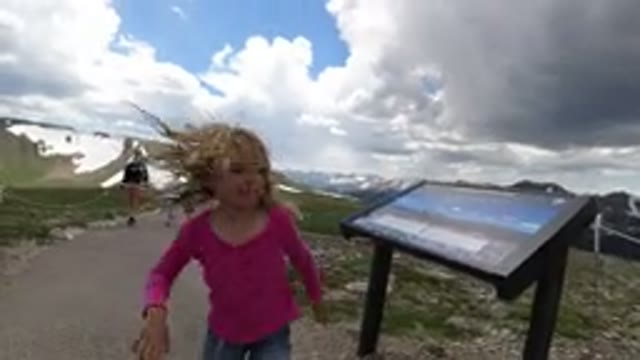 WINTER PARK COLORADO-2019: A Girl Running From The Tourist Group To Make Him