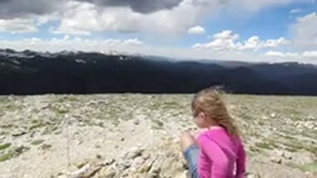 WINTER PARK COLORADO-2019: Little Girl And Her Sister Playing And Enjoying The Snow