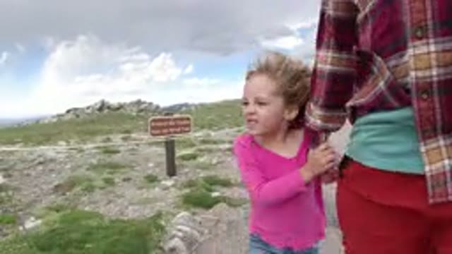 WINTER PARK COLORADO-2019: A Mom And Daughter Walking In The Single Way